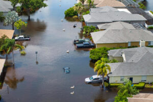 Flooded street and houses after heavy rain.