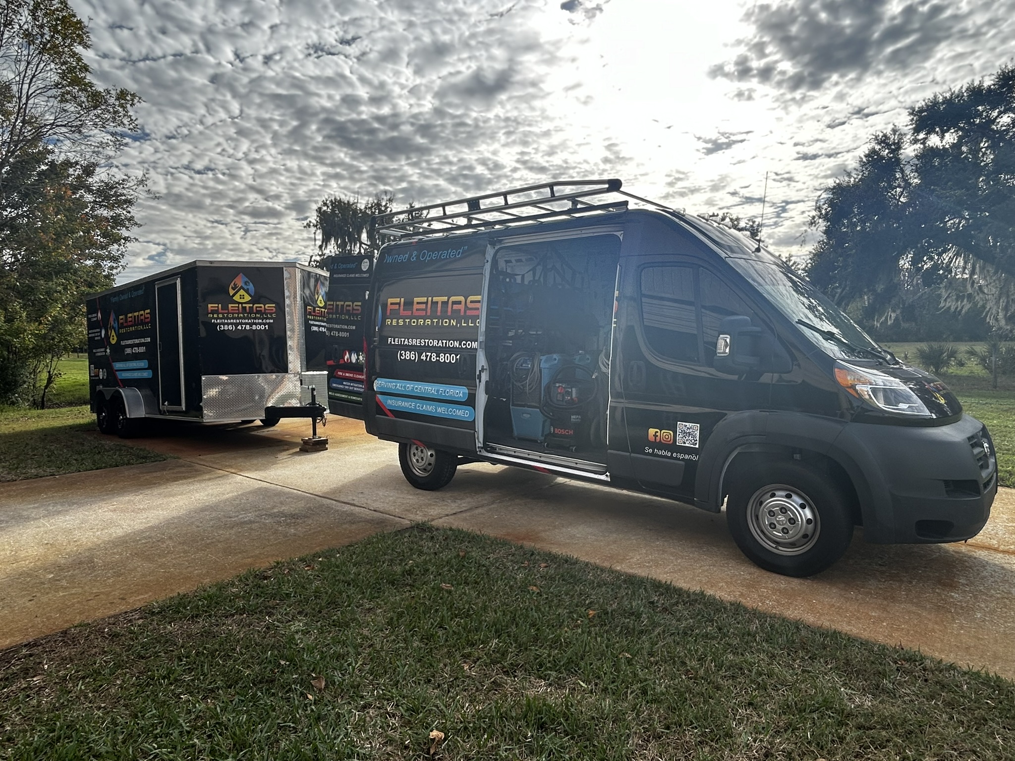 Fleitas Restoration van and trailer on driveway